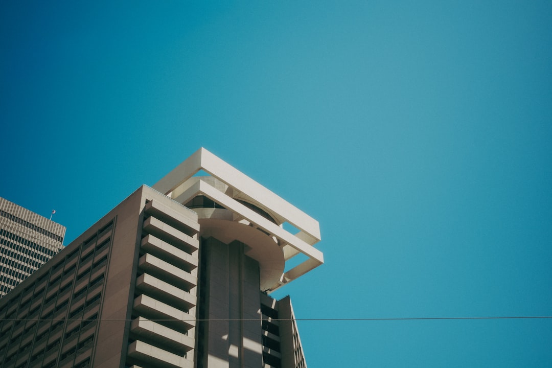 Modern building against a clear blue sky.